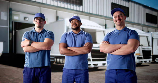 istock Cheerful truck drivers flashing big smiles 2195283887