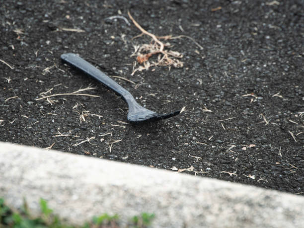 istock Fork on the ground. It was not thrown in the trash but left on the ground. 2195285068