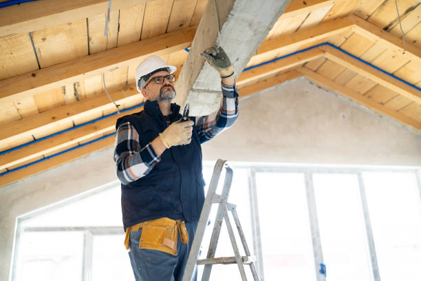 istock Construction Worker Inspecting Wiring in a Modern Wooden House 2195285579