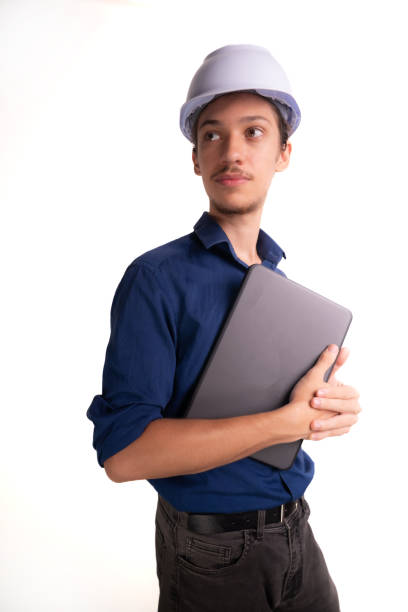 Young man working on laptop.
