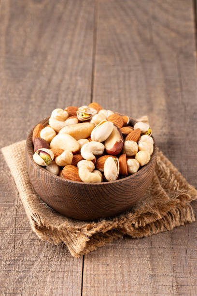 istock Healthy mix nuts. Almonds, hazelnuts, cashews, peanuts, pistachios, Brazil nuts 2195286735