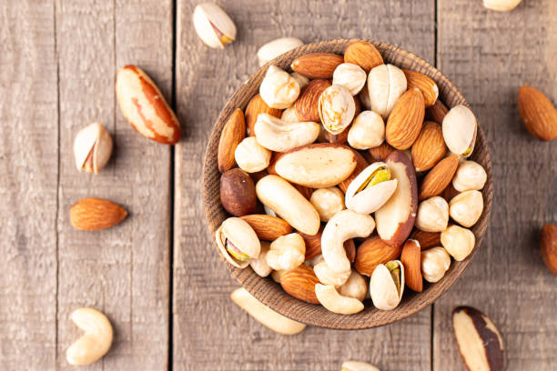 istock Healthy mix nuts. Almonds, hazelnuts, cashews, peanuts, pistachios, Brazil nuts 2195286792
