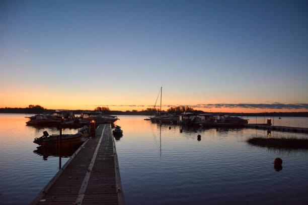 istock Small marina on the Richelieu River in Quebec at sunset 2195294139
