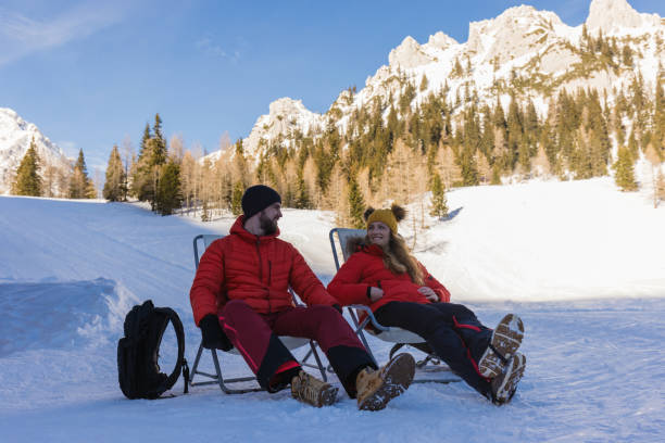 istock couple enjoys a relaxing day outdoors in winter 2195312242