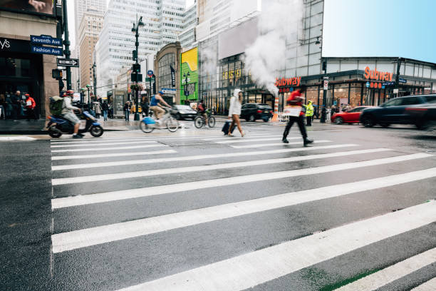 istock Busy crosswalk and road intersection in New York Manhattan 2195315516