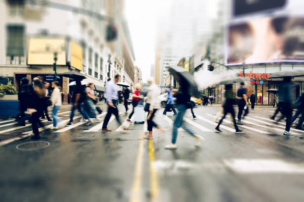istock Busy crosswalk and road intersection in New York Manhattan 2195315561