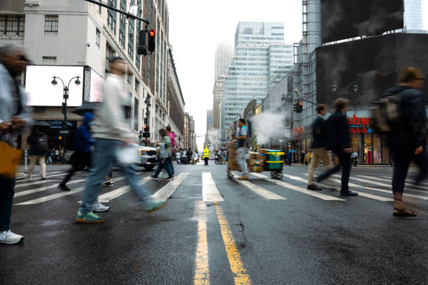 istock Busy crosswalk and road intersection in New York Manhattan 2195315608