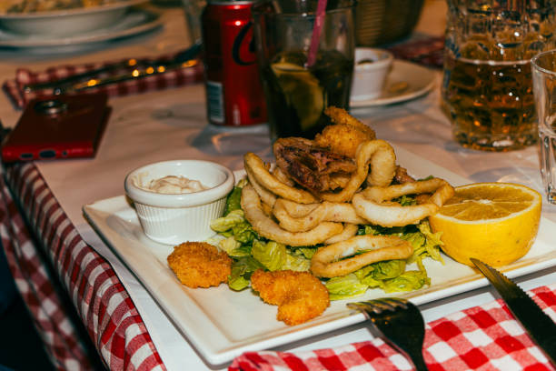 istock Deep fried shrimp and calamari rings in Marrakech restaurant. 2195315681