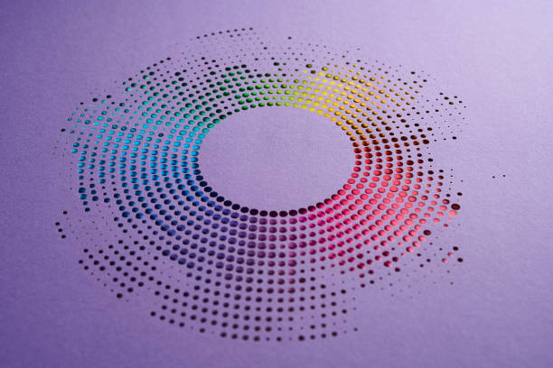 istock Vibrant Circular Cut Paper Design with Gradient Rainbow Colors on Purple Background 2195322963