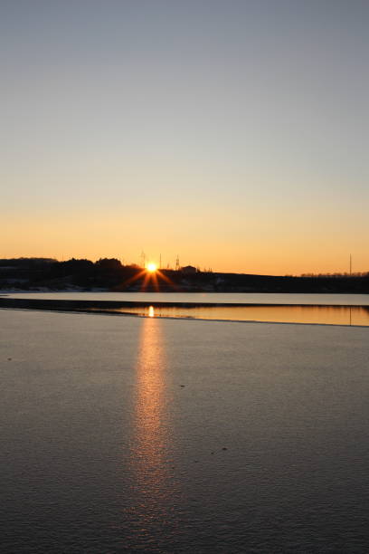istock A sunset over a body of water 2195327039