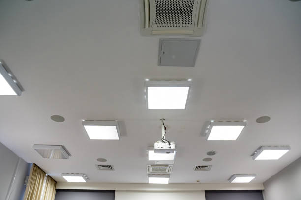 istock A Modern Office featuring a stylish Ceiling equipped with advanced Lighting and Air Conditioning Systems for ultimate comfort and ambiance 2195328504