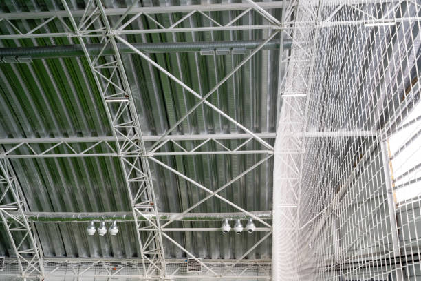 istock The buildings ceiling features an elaborate design with intricately arranged metal beams, providing structural support while creating a captivating aesthetic that draws attention 2195328549
