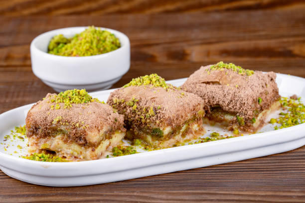 istock Turkish dessert cold baklava wooden background 2195329166