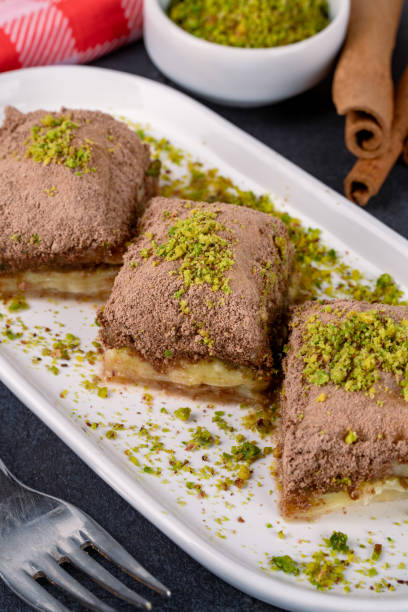 istock Turkish dessert cold baklava on black background 2195329234
