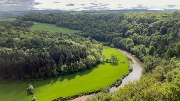 istock Idyllic Countryside Landscape with Wye River Surrounded by Forested Hills 2195334237