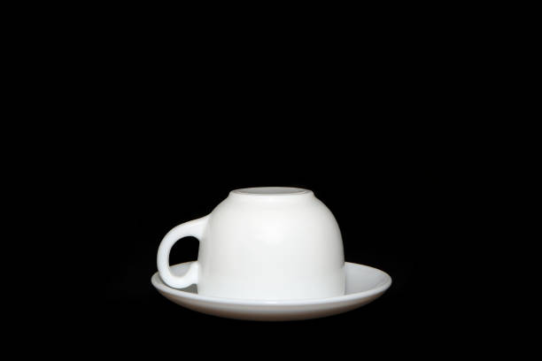 Close-Up Of Coffee Cup On Black Background
