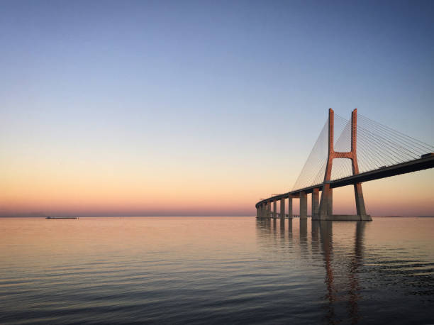 istock Vasco da Gama bridge at sunset, Lisboa, Portugal, December 2017 2195337177