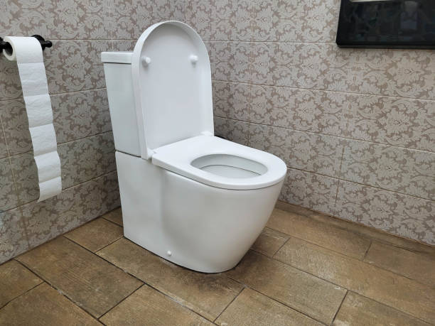 istock White ceramic toilet bowl in the bathroom 2195337432