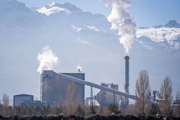 istock Refinery With Many Smoke Against Sky 2195337722