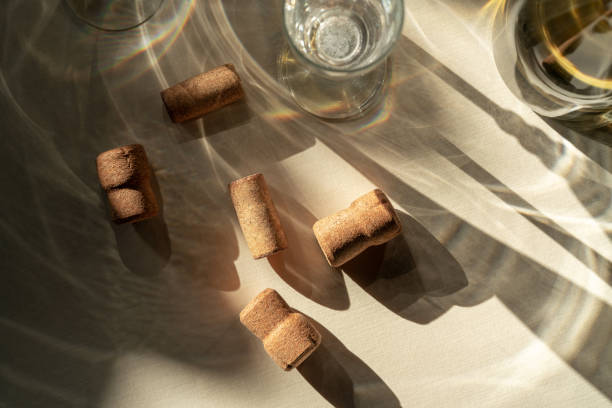 istock Different glasses for wine, cocktails, drinks, long sun shadow on a light beige background. The concept of wine tasting or summer vacation 2195338113