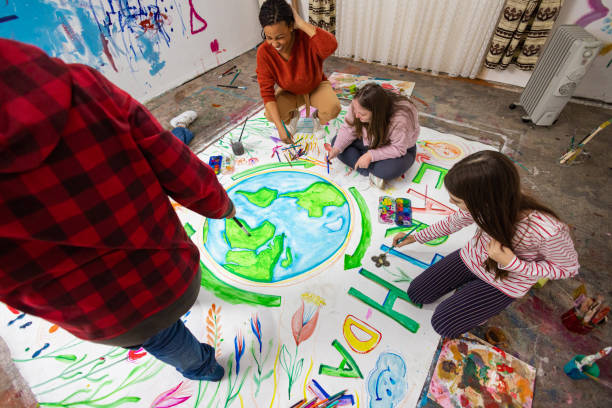 istock Kids and Teacher Draw for Earth Day 2195338817