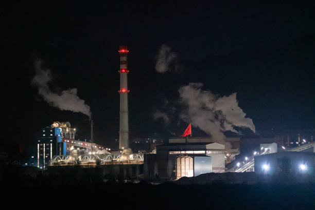 istock The industrial area shines at night. 2195339800