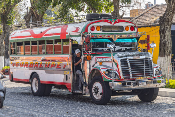 Antigua Guatemala, Sacatepequez, Guatemala. March 8, 2024. A colorful bus in Antigua Guatemala.