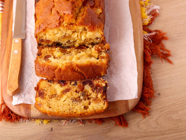 istock Fruit cake with cherry, pineapple and sultana, sliced 2195341813
