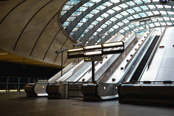 istock Escalators leading to way out in modern architecture station 2195343195