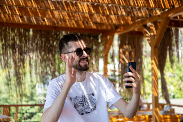 istock Man taking a selfie in a summer place 2195343493