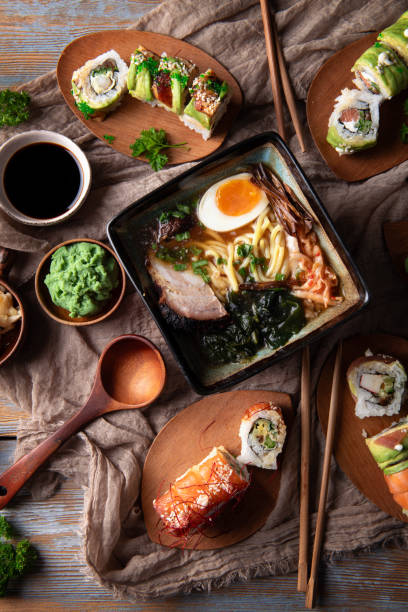 Ramen and Sushi set on a dark table background