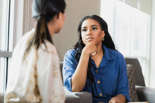 istock Two Women in Deep Conversation, Showing Empathy and Support 2195349034