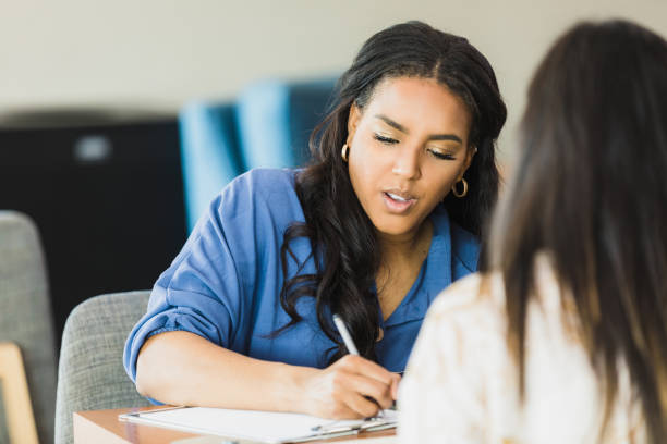 istock Confident Woman Therapist Counseling a Patient 2195349056