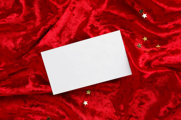 istock Blank business card on red fabric, top view. Mockup for design 2195349833