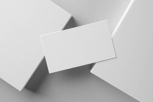 istock Empty business card and decorative elements on white background, top view. Mockup for design 2195349845