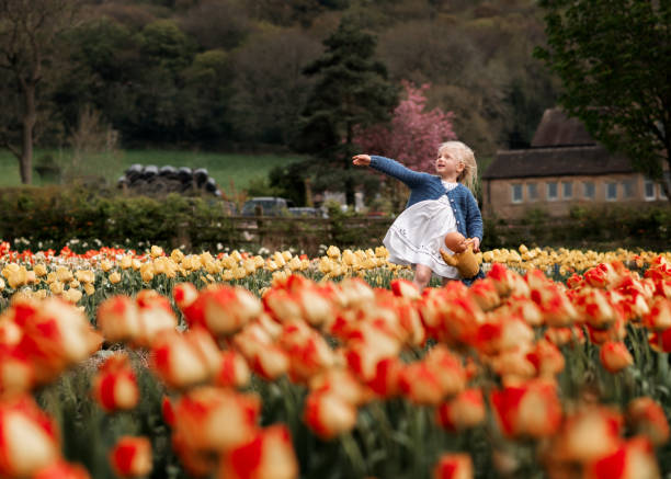 istock dancing girl in tulips 2195350338