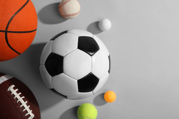 istock Many different sports balls on gray background, flat lay. Space for text 2195351817