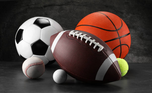 istock Many different sports balls on dark gray background 2195351821