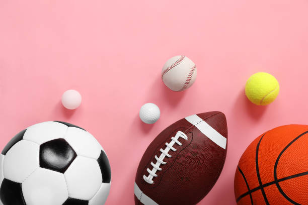 istock Many different sports balls on pink background, flat lay. Space for text 2195351852