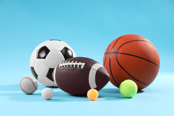 istock Many different sports balls on light blue background 2195351975