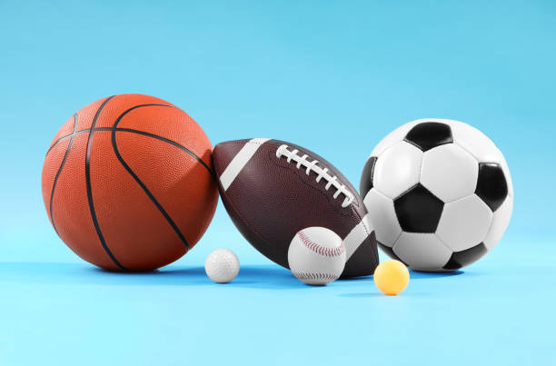 istock Many different sports balls on light blue background 2195351993