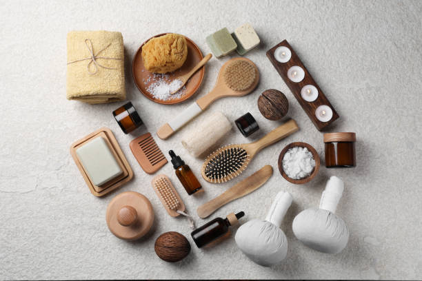 istock Flat lay composition with different spa products and burning candles on light grey textured table 2195353954