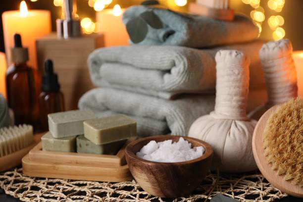 istock Beautiful composition with different spa products on table against blurred lights 2195353998
