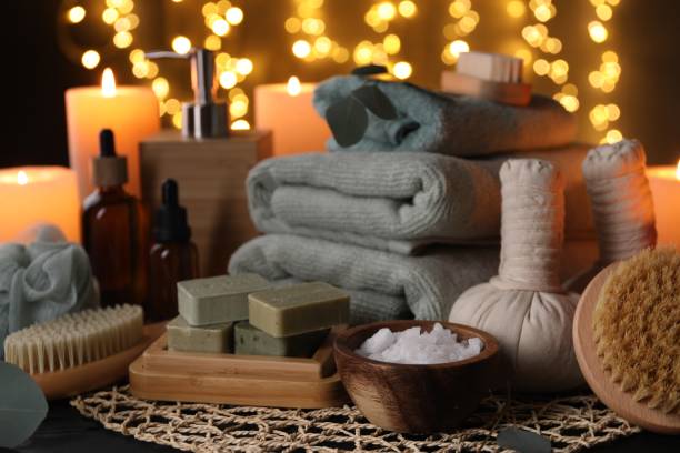 istock Beautiful composition with different spa products on table against blurred lights 2195354569