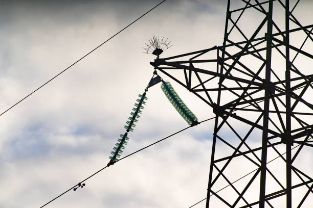 High-voltage electric pole on sky background, closeup, low angle view  (Voronezh region, Voronezh, Russia)