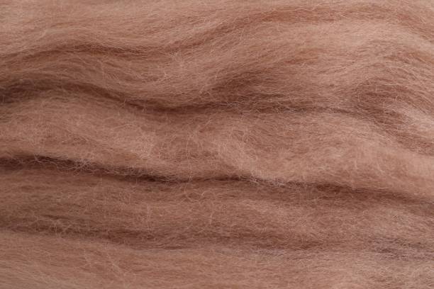 istock Soft felting wool as background, closeup view 2195355973