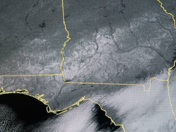 Visible satellite image depicts record breaking snowfall over the southeast on January 22, 2025. NOAA imagery shows white snowpack over southern Alabama, southern Georgia and the Florida panhandle. Cold advection clouds shown further south over Florida and the Gulf of Mexico. Information provided by NOAA / NESDIS Center for Satellite Applications and Research. https://www.star.nesdis.noaa.gov/star/productdisclaimer.php