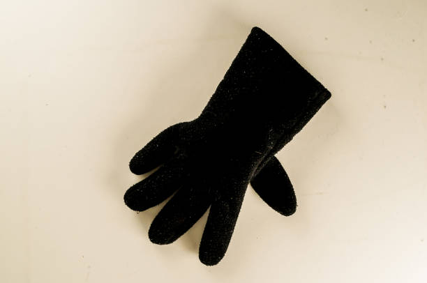 istock A black glove is on a white background 2195358905