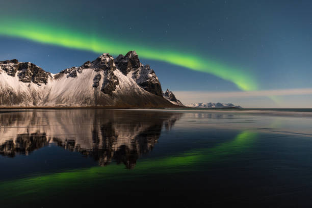 istock Aurora Borealis over mountain Vestrahorn in Iceland 2195359484