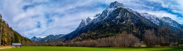 istock Idyllic Alpine Landscape with Snow-Capped Mountains 2195360901